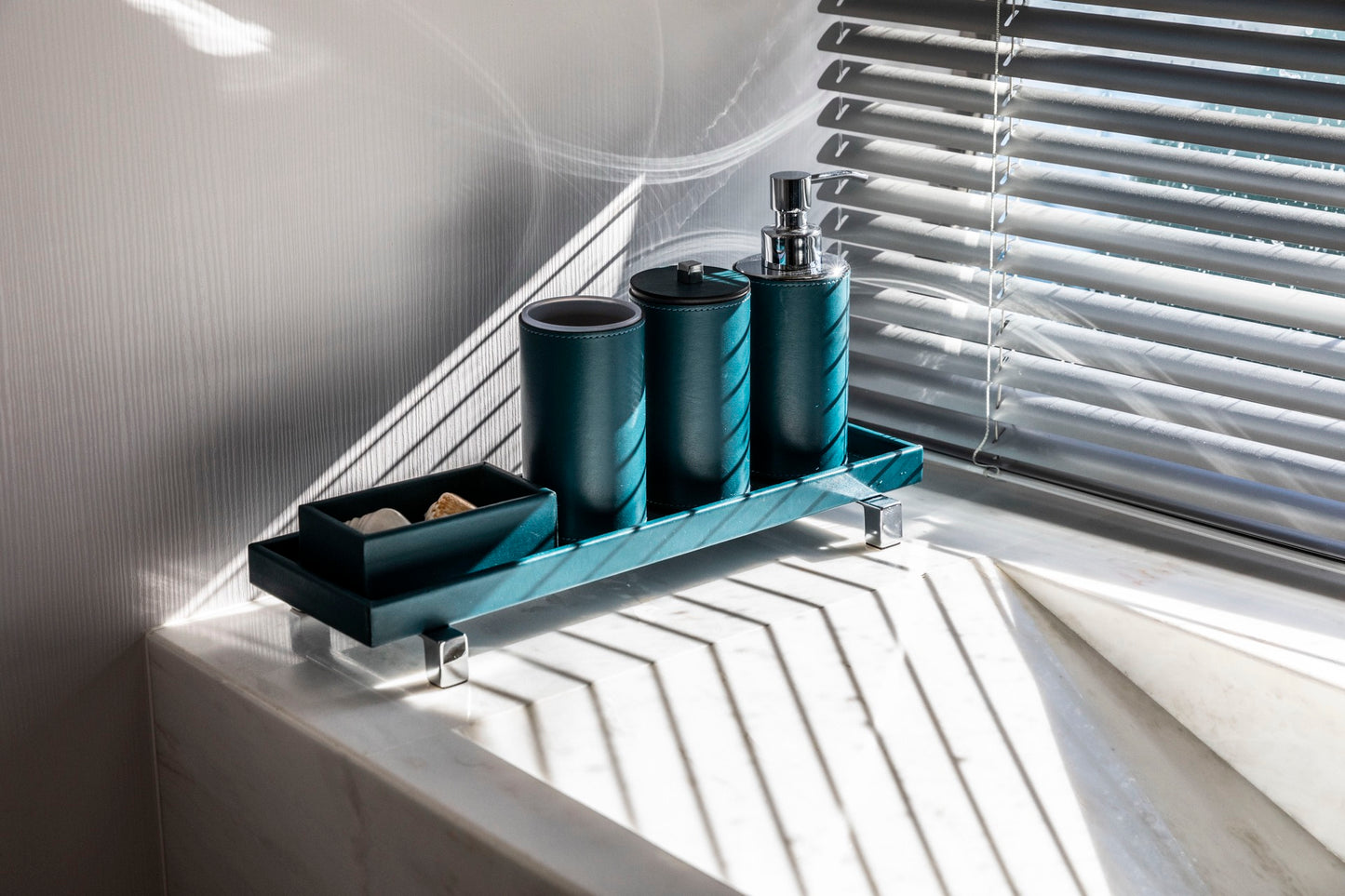 Pinetti | Poseidon Leather-Covered Soap Dispenser: Leather soap dispenser in square and round formats, chrome or shiny gold | Bathroom | 2Jour Concierge, your luxury lifestyle shop | luxury soap dispenser, leather bathroom accessory, Pinetti bathroom set, Poseidon collection, Italian luxury bathroom, designer soap dispenser, chrome gold bathroom accessories, premium vanity accessory