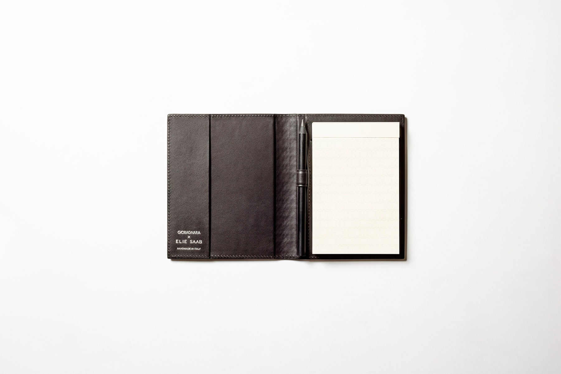 Giobagnara x Elie Saab Monogram Notepad Holder | Padded leather cover featuring the Elie Saab Monogram pattern and suede lining | Includes an elastic pencil holder with pen and a notepad with 70 ivory sheets | Available in small (A6), medium (A5), and large (A4) sizes | Office Accessories | 2Jour Concierge, your luxury lifestyle shop