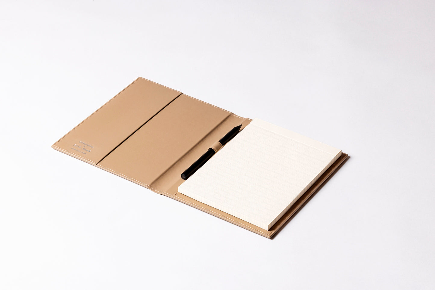 Giobagnara x Elie Saab Monogram Notepad Holder | Padded leather cover featuring the Elie Saab Monogram pattern and suede lining | Includes an elastic pencil holder with pen and a notepad with 70 ivory sheets | Available in small (A6), medium (A5), and large (A4) sizes | Office Accessories | 2Jour Concierge, your luxury lifestyle shop