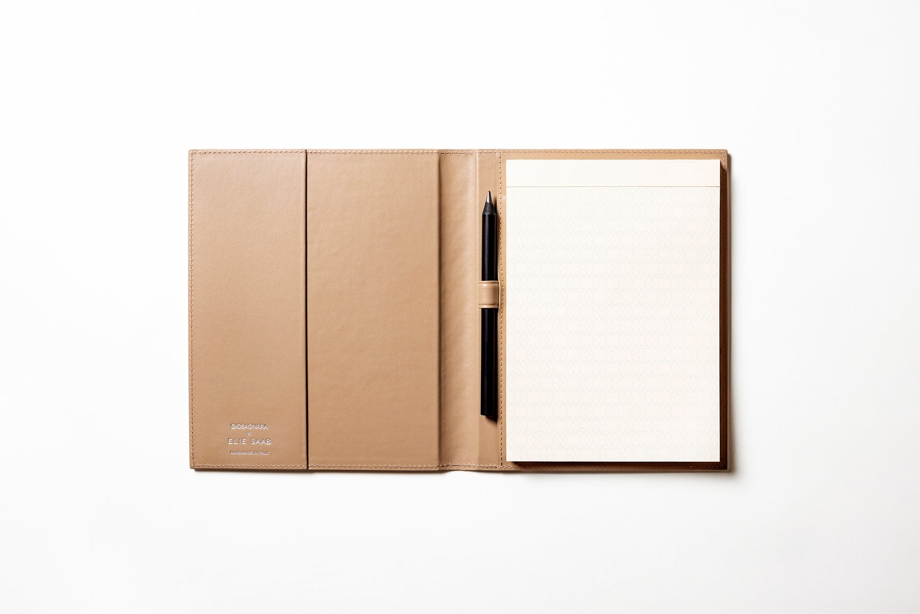 Giobagnara x Elie Saab Monogram Notepad Holder | Padded leather cover featuring the Elie Saab Monogram pattern and suede lining | Includes an elastic pencil holder with pen and a notepad with 70 ivory sheets | Available in small (A6), medium (A5), and large (A4) sizes | Office Accessories | 2Jour Concierge, your luxury lifestyle shop