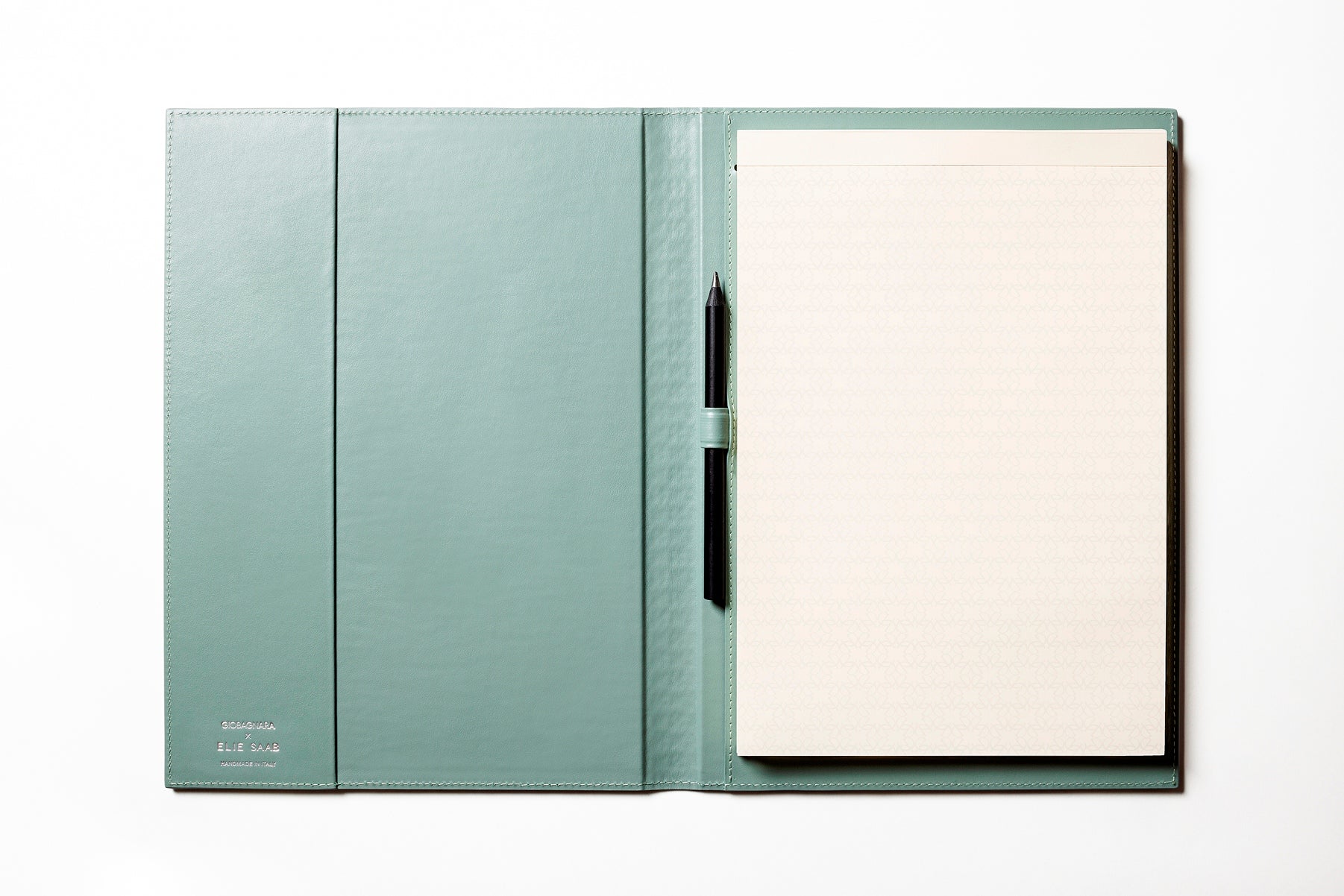 Giobagnara x Elie Saab Monogram Notepad Holder | Padded leather cover featuring the Elie Saab Monogram pattern and suede lining | Includes an elastic pencil holder with pen and a notepad with 70 ivory sheets | Available in small (A6), medium (A5), and large (A4) sizes | Office Accessories | 2Jour Concierge, your luxury lifestyle shop