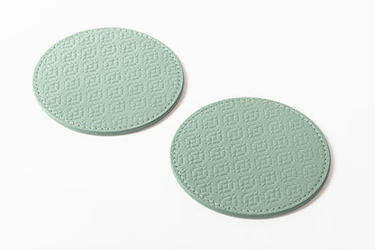 Giobagnara x Elie Saab Monogram Coasters (Set of 2) | Made of padded leather featuring the Elie Saab Monogram pattern | Elegant and stylish design | Perfect for protecting surfaces while adding a touch of luxury | Home Decor and Serveware | 2Jour Concierge, your luxury lifestyle shop