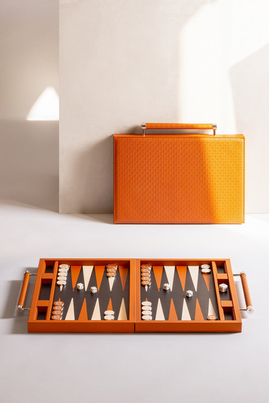 Giobagnara x Elie Saab Monogram Backgammon Case With Handles | Leather-covered case featuring the Elie Saab monogram pattern and inlaid leather playing field | Inner dividers hold two sets of polished palladium backgammon checkers with leather inserts and shiny silver debossed decorations | Includes 4 dice and a doubling cube | Stylish and sophisticated game case | Home Decor and Games | 2Jour Concierge, your luxury lifestyle shop