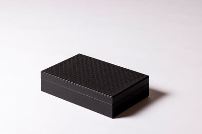 Giobagnara x Elie Saab Monogram Domino Game Set | Leather box with a hinged leather lid featuring the Elie Saab Monogram pattern | Equipped with highly resistant glossy plexiglass domino pieces | Games and Entertainment | 2Jour Concierge, your luxury lifestyle shop