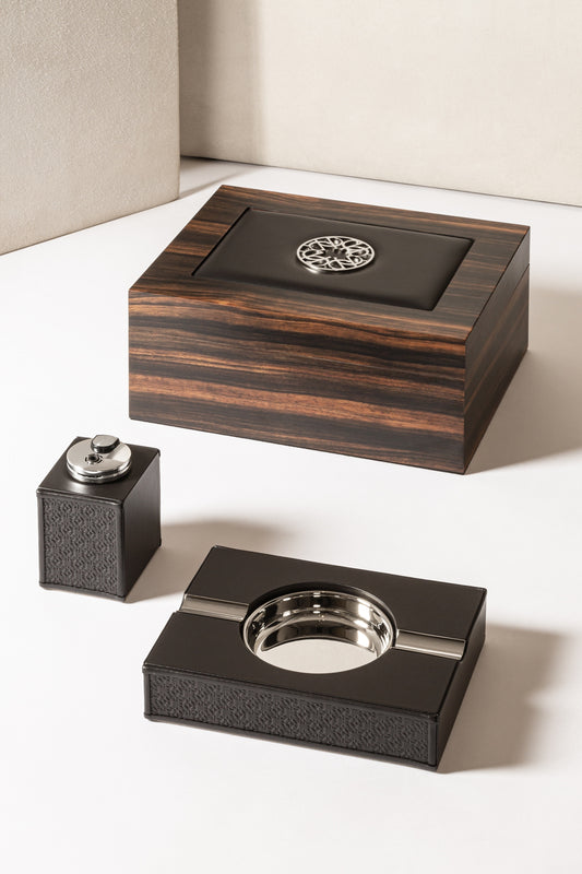 Giobagnara x Elie Saab Ecusson Cigar Humidor | Macassar ebony cigar humidor with padded leather inlay featuring the Elie Saab Monogram in polished palladium | Cedar wood lining | Luxurious and elegant storage for cigars | Home Decor and Accessories | 2Jour Concierge, your luxury lifestyle shop
