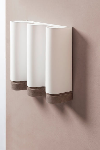 Giobagnara x Francesco Balzano Ossicle Wall Lamp | E14 100 W bulbs (not included) | Part of the Ossicle collection, inspired by the ancient “Jeu des Osselets,” combining monolithic volumes with contemporary minimal lines in meticulously chosen leather | Lighting and Decor | 2Jour Concierge, your luxury lifestyle shop