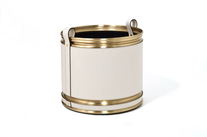 Pinetti | Leather-Covered Cachepot with Wheels: Leather-covered metal cachepot with handle and wheels, in two sizes and chrome, satin brass, or burnished finish | Living Room / Cachepots | 2Jour Concierge, your luxury lifestyle shop | luxury cachepot, designer plant pot cover, leather cachepot, Italian leather home accessories, premium indoor plant holder, Pinetti leather objects, high-end living room decor, leather plant pot, luxury interior planter, designer cachepot with wheels