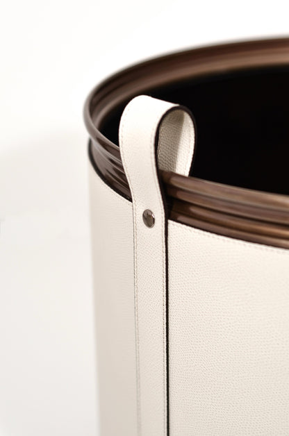Pinetti | Leather-Covered Cachepot with Wheels: Leather-covered metal cachepot with handle and wheels, in two sizes and chrome, satin brass, or burnished finish | Living Room / Cachepots | 2Jour Concierge, your luxury lifestyle shop | luxury cachepot, designer plant pot cover, leather cachepot, Italian leather home accessories, premium indoor plant holder, Pinetti leather objects, high-end living room decor, leather plant pot, luxury interior planter, designer cachepot with wheels