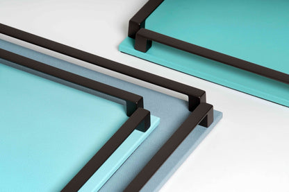 Pinetti Paul | Leather & Metal Trays: Wood base covered in leather, metal handles with chrome, burnished, or gold finish, non-slip base, available in multiple sizes | Tabletop & Bar / Trays | 2Jour Concierge, your luxury lifestyle shop | luxury interiors, refined dining, yacht décor, hospitality décor, elegant serving accessories, boutique hotels, office décor, contemporary living