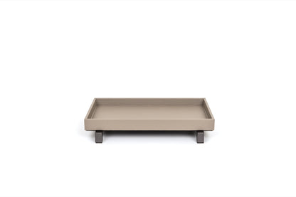 Pinetti | Rialto Leather Tray: Wood base covered in leather with metal feet in chrome, satin, or burnished finish, round and rectangular forms | Tabletop | 2Jour Concierge, your luxury lifestyle shop | luxury tray, Pinetti Rialto, leather tray with feet, raised leather tray, Italian luxury tabletop, designer serving tray, wood leather tray