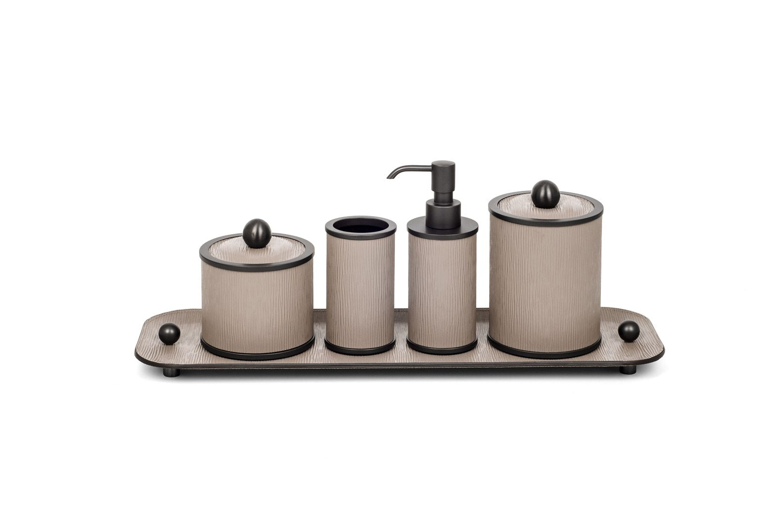 Olimpia Leather Covered Bathroom Set by Pinetti | Made in brass with shiny gold, burnished, or chromed finish | Consists of items available separately: soap dispenser, toothbrush holder, small box, large box | Home Decor Bathroom Accessories | 2Jour Concierge, your luxury lifestyle shop