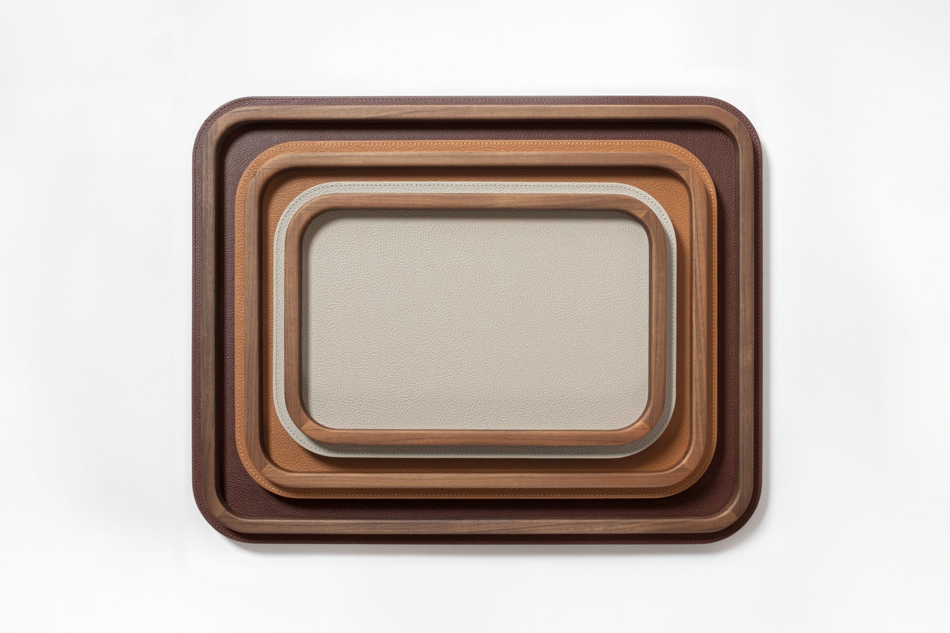 Giobagnara x Poltrona Frau Rectangular Rounded Tray with Wood Frame | Leather-Covered Trays with Rounded Corners | Walnut Wood Frame for Elegant Design | Explore a Range of Stylish Trays and Home Decor at 2Jour Concierge, #1 luxury high-end gift & lifestyle shop