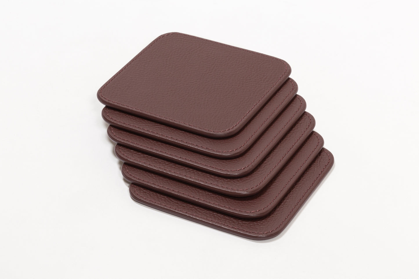 Giobagnara x Poltrona Frau Coaster Holder With 6 Coasters | All-Leather Coasters | Leather-Covered Coaster Holder with Walnut Wood Inserts | Stylish and Elegant Home Accessories | Explore a Range of Luxury Home Decor at 2Jour Concierge, #1 luxury high-end gift & lifestyle shop