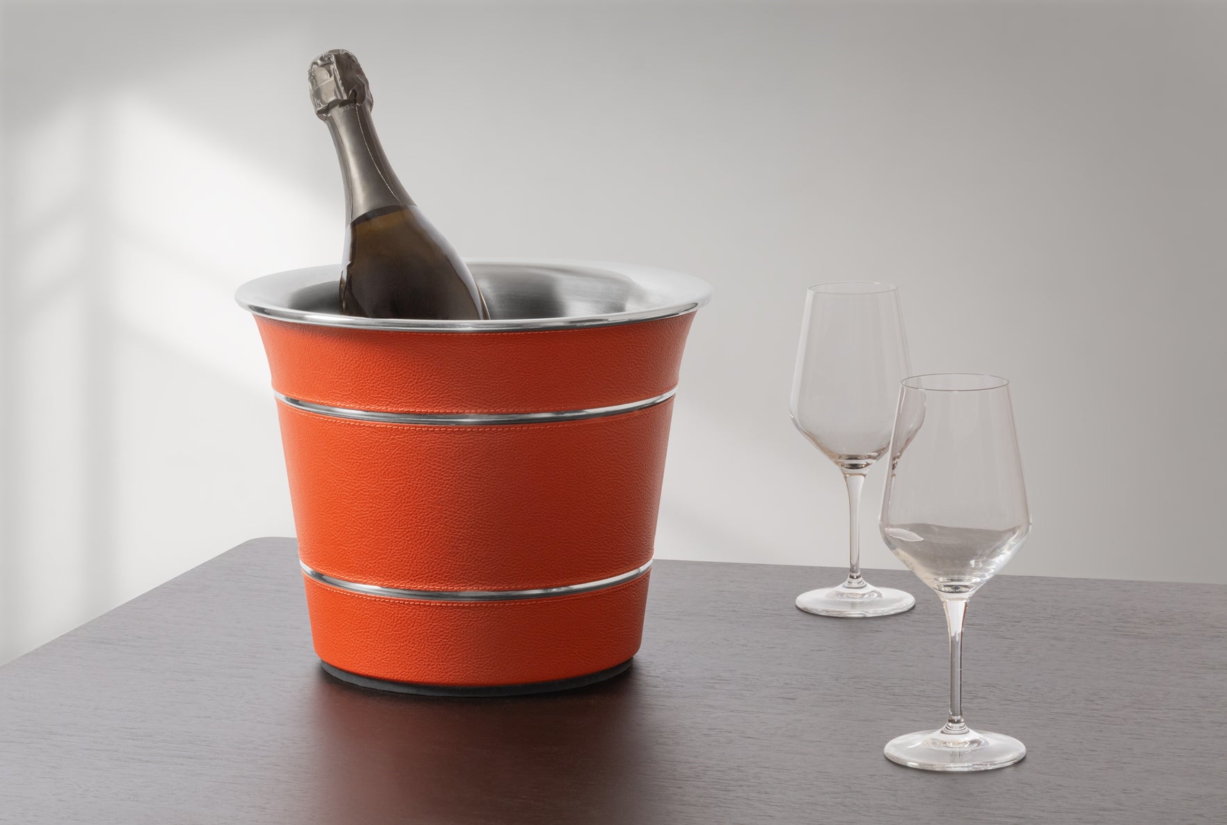 Giobagnara x Poltrona Frau Leather Champagne Bucket | Insulated Double-Chamber Polished Steel Structure | Elegant Leather Detailing | Sturdy and Stylish Design | Made in Pelle Frau® Leather | Elevate Your Champagne Experience at 2Jour Concierge, #1 luxury high-end gift & lifestyle shop