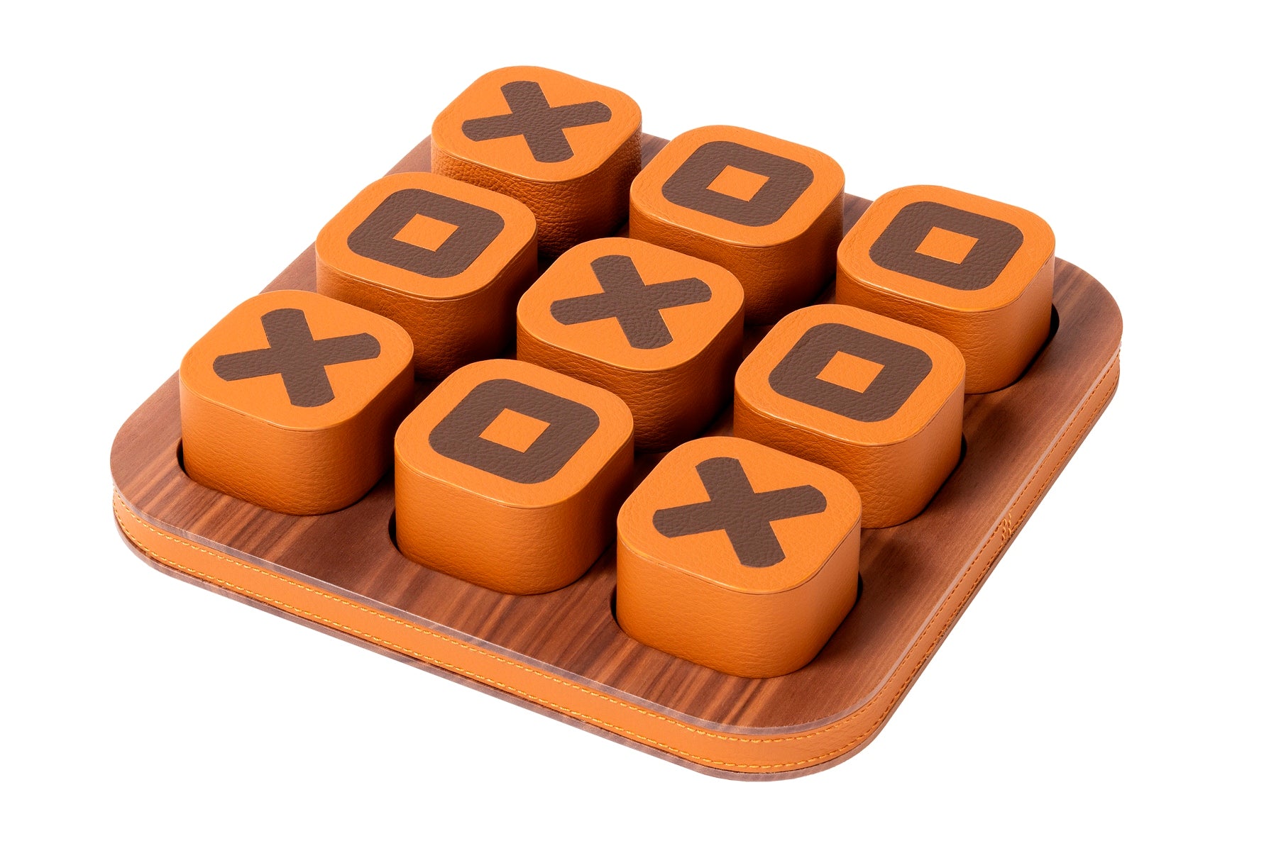 Giobagnara x Poltrona Frau tic tac toe | Leather-covered playing pieces with inlaid graphic motifs | Walnut wood base adorned with refined leather detailing | A luxurious twist on a classic game | Entirely made in Pelle Frau® | Home decor & game sets | 2Jour Concierge, your luxury lifestyle shop
