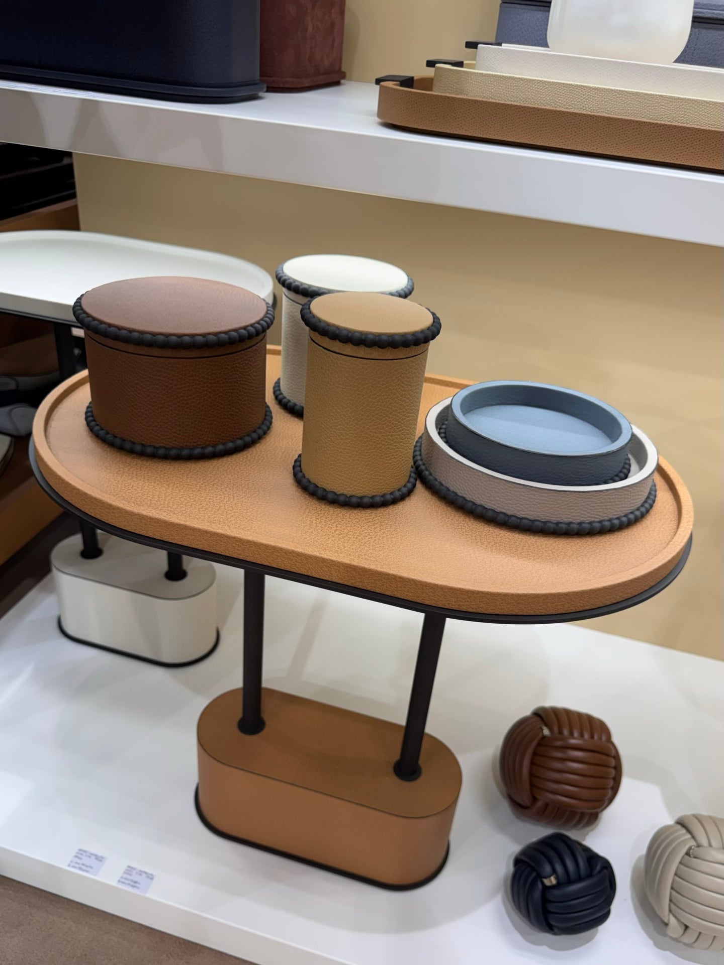Giobagnara | Perla Round Valet Tray: Leather-covered round form with metal ring of linked spheres in chrome, bronze, or brass | Decor | 2Jour Concierge, your luxury lifestyle shop | luxury valet tray, Giobagnara Perla, round leather tray, Italian luxury decor, designer catch-all tray
