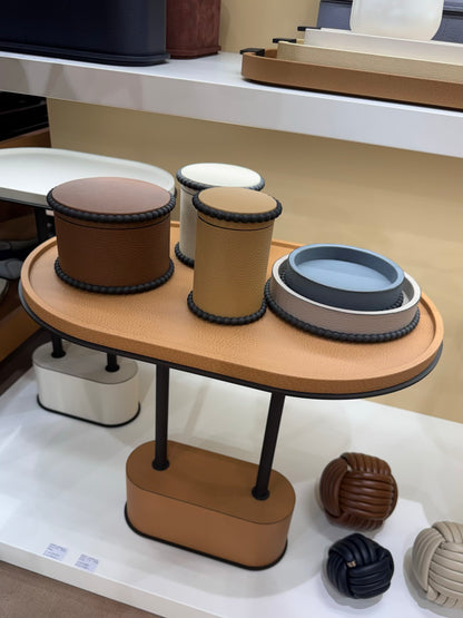 Giobagnara | Perla Round Valet Tray: Leather-covered round form with metal ring of linked spheres in chrome, bronze, or brass | Decor | 2Jour Concierge, your luxury lifestyle shop | luxury valet tray, Giobagnara Perla, round leather tray, Italian luxury decor, designer catch-all tray
