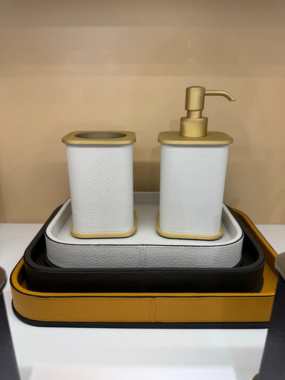 Giobagnara | Polo Leather Bathroom Set: Leather-covered body with rounded silhouette and metal pump in chrome, bronze, or brass | The Bathroom | 2Jour Concierge, your luxury lifestyle shop | luxury soap dispenser, Giobagnara Polo, leather bathroom accessory, Italian designer soap dispenser