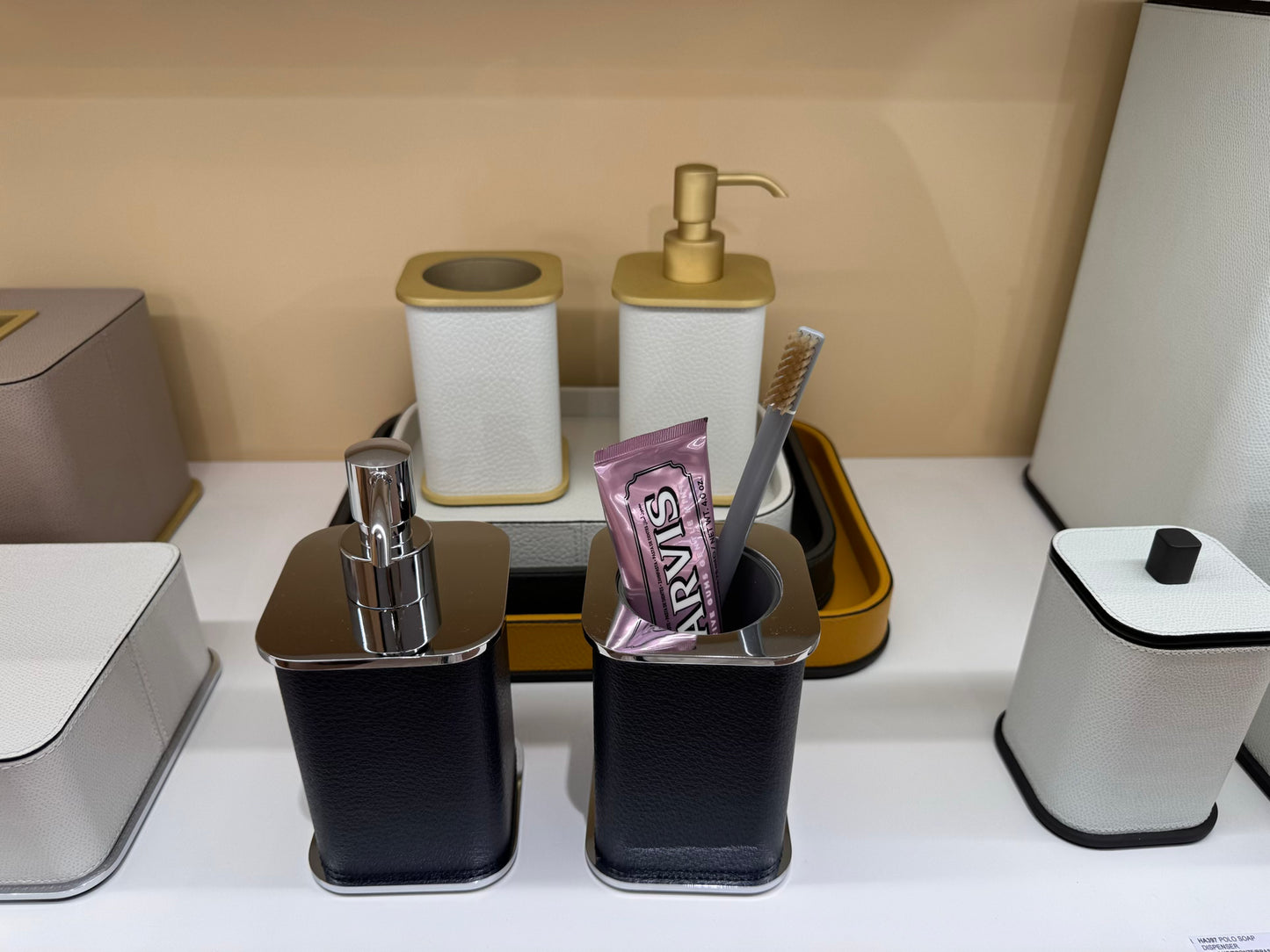 Giobagnara | Polo Leather Bathroom Set: Leather-covered body with rounded silhouette and metal pump in chrome, bronze, or brass | The Bathroom | 2Jour Concierge, your luxury lifestyle shop | luxury soap dispenser, Giobagnara Polo, leather bathroom accessory, Italian designer soap dispenser
