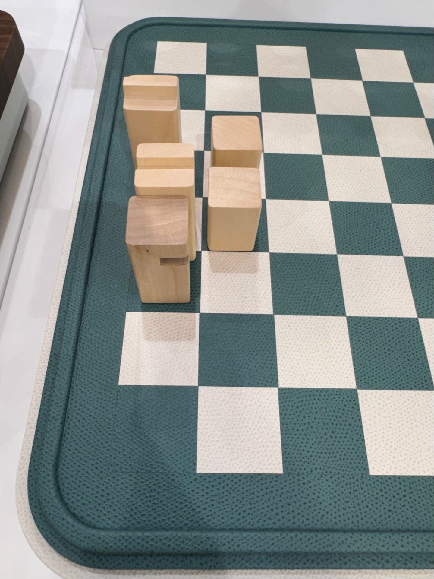 Giobagnara | Rolli Chess and Draughts Set: Leather-covered case with marquetry lid, maple and walnut pieces, leather-inlaid draughts | Game Room | 2Jour Concierge, your luxury lifestyle shop | luxury chess set, Giobagnara Rolli, leather chess board, Italian designer game set, luxury board game