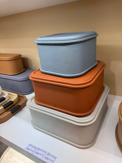 Giobagnara | Rolli Trinket Box: Leather-covered box with layered architectural profiles, monochrome and bicolor, in square, rectangular, long rectangular, and round forms | Decor | 2Jour Concierge, your luxury lifestyle shop | luxury trinket box, Giobagnara Rolli, architectural leather box, Italian designer box