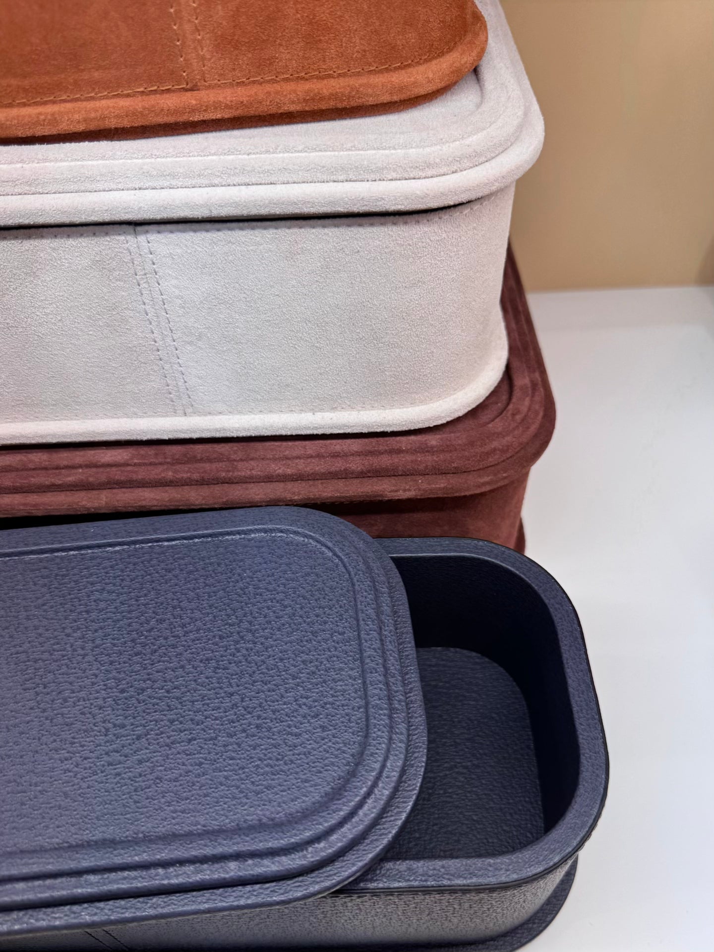 Giobagnara | Rolli Trinket Box: Leather-covered box with layered architectural profiles, monochrome and bicolor, in square, rectangular, long rectangular, and round forms | Decor | 2Jour Concierge, your luxury lifestyle shop | luxury trinket box, Giobagnara Rolli, architectural leather box, Italian designer box