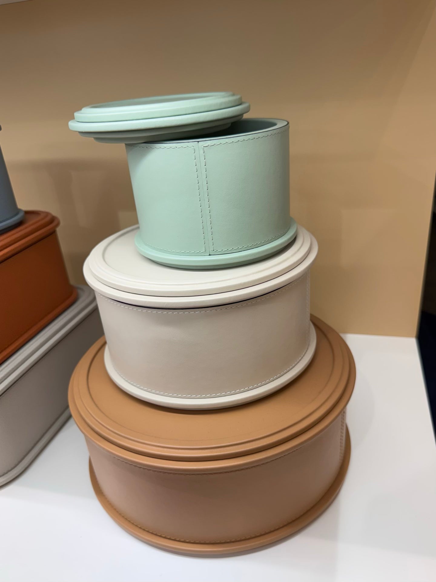 Giobagnara | Rolli Trinket Box: Leather-covered box with layered architectural profiles, monochrome and bicolor, in square, rectangular, long rectangular, and round forms | Decor | 2Jour Concierge, your luxury lifestyle shop | luxury trinket box, Giobagnara Rolli, architectural leather box, Italian designer box