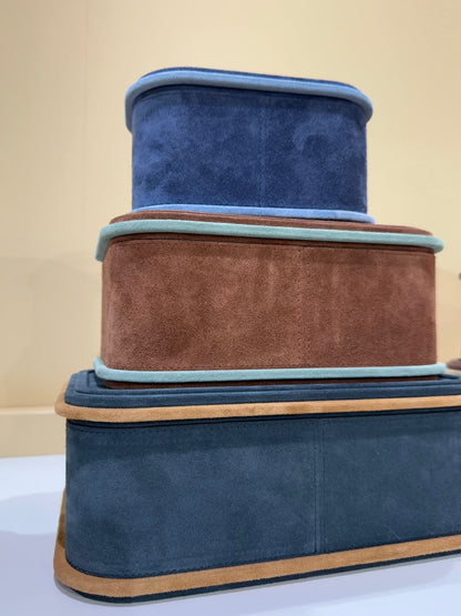 Giobagnara | Rolli Trinket Box: Leather-covered box with layered architectural profiles, monochrome and bicolor, in square, rectangular, long rectangular, and round forms | Decor | 2Jour Concierge, your luxury lifestyle shop | luxury trinket box, Giobagnara Rolli, architectural leather box, Italian designer box
