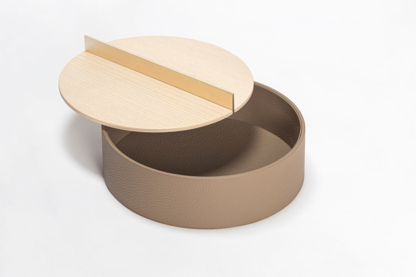 Riviere Dama | Round Box: Leather with wood base and brushed metal handle, available in ashwood or walnut, small and large formats, designed for elegant tabletop storage | Decor / Trinket Boxes | 2Jour Concierge, your luxury lifestyle shop | luxury interiors, hospitality décor, elegant living, designer home accessories, boutique hotels, refined lifestyle, yacht décor, executive interiors