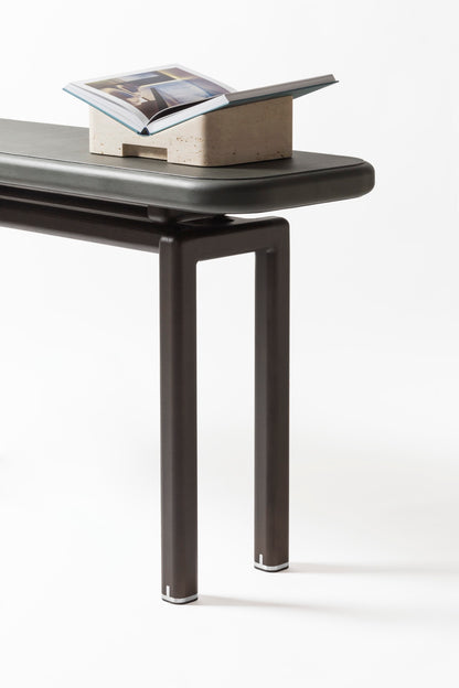 Giobagnara × Glenn Sestig | Lloyd Console: Leather and Canaletto walnut with iron or brushed bronze feet | Furniture / Console Tables + Étageres | 2Jour Concierge, your luxury lifestyle shop | modern craftsmanship, Italian design, sculptural interiors, refined living