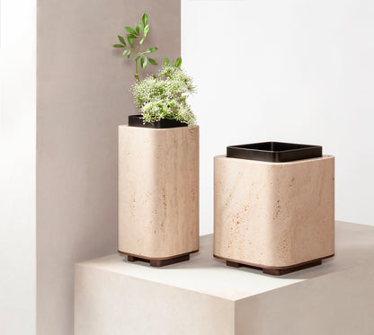 Giobagnara x Glenn Sestig Lloyd Vase | Travertine structure with a removable burnished-brushed bronze container seated on a walnut- or wenge-finished wood base, blending organic stone with metallic warmth | Crafted in Italy by Giobagnara in collaboration with designer Glenn Sestig | Home Decor / Vases | 2Jour Concierge, your luxury lifestyle shop
