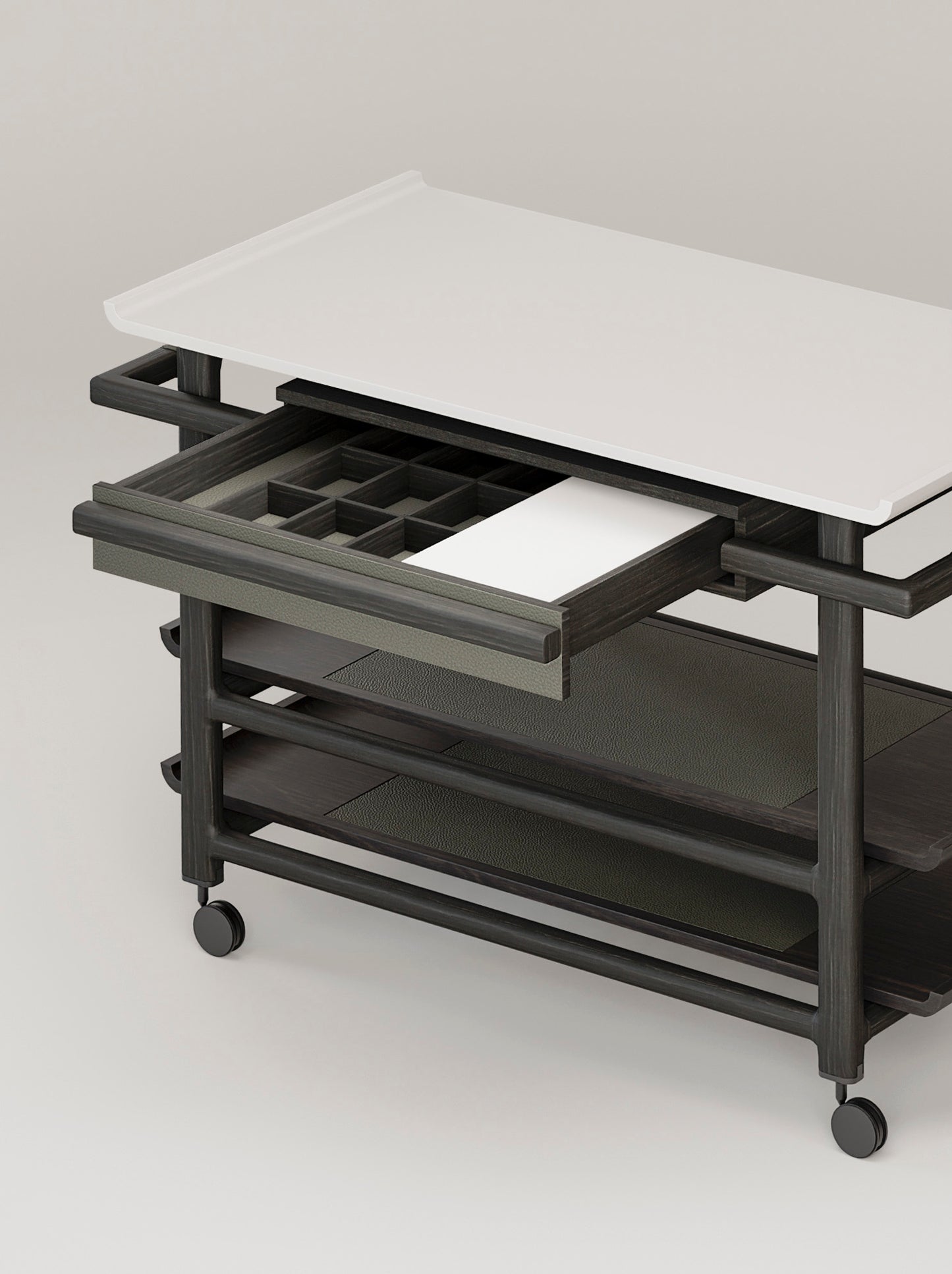 Giobagnara x Glenn Sestig Lloyd Tabi serving trolley | Elegant serving cart with a Corian® top and fine leather-lined drawer | Wood structure available in dark walnut, wenge, or natural finishes | Includes Corian® chopping board and removable wooden dividers for customizable storage | Features burnished brushed bronze wheels for smooth mobility | A refined and functional piece for serving and organizing essentials | Home furniture & serving accessories | 2Jour Concierge, your luxury lifestyle shop