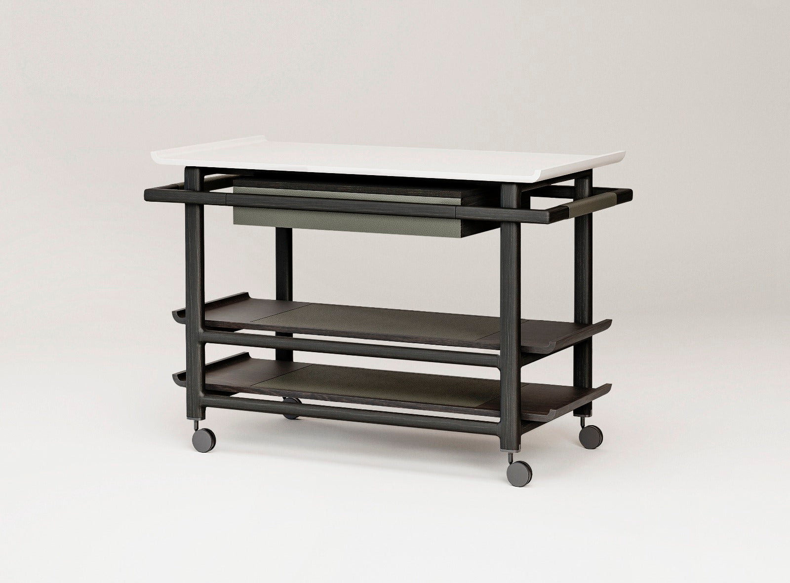 Giobagnara x Glenn Sestig Lloyd Tabi serving trolley | Elegant serving cart with a Corian® top and fine leather-lined drawer | Wood structure available in dark walnut, wenge, or natural finishes | Includes Corian® chopping board and removable wooden dividers for customizable storage | Features burnished brushed bronze wheels for smooth mobility | A refined and functional piece for serving and organizing essentials | Home furniture & serving accessories | 2Jour Concierge, your luxury lifestyle shop