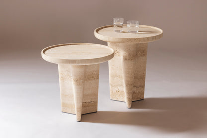 Giobagnara × Glenn Sestig Tanell | Travertine Round Side Tables: Sculptural base in classic or titanium travertine with smooth circular top | Furniture / Side Tables + Bar Tables | 2Jour Concierge, your luxury lifestyle shop | luxury interiors, refined living, boutique hotels, designer furniture, yacht décor, hospitality spaces, contemporary stone design