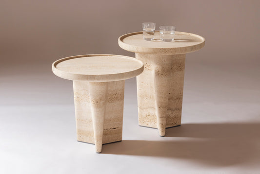 Giobagnara × Glenn Sestig Tanell | Travertine Round Side Tables: Sculptural base in classic or titanium travertine with smooth circular top | Furniture / Side Tables + Bar Tables | 2Jour Concierge, your luxury lifestyle shop | luxury interiors, refined living, boutique hotels, designer furniture, yacht décor, hospitality spaces, contemporary stone design