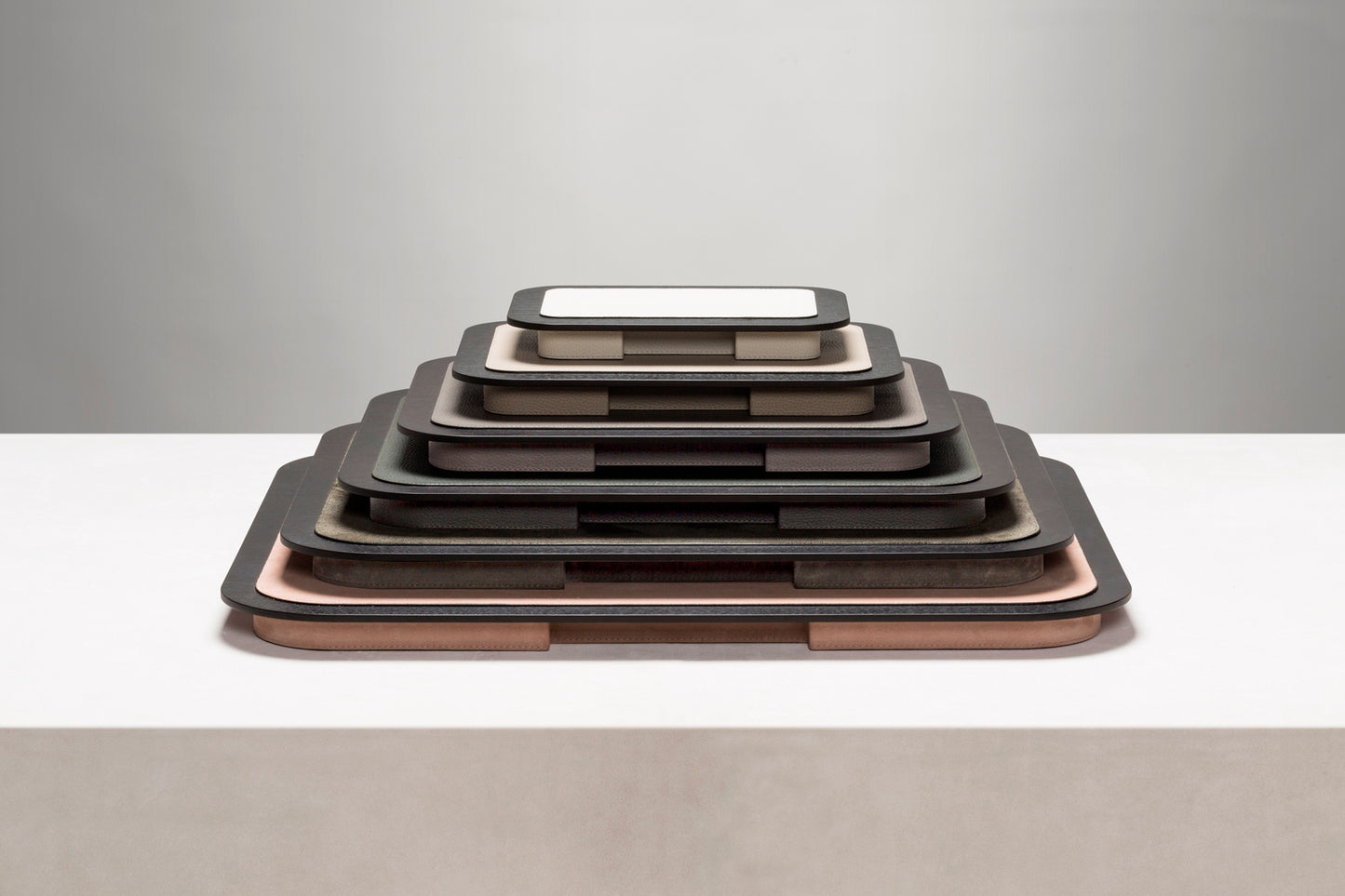 Giobagnara x Glenn Sestig Lloyd Tray | Partially leather-covered wood structure with walnut or wenge wood finish | Elegant and contemporary design | Home Decor and Serveware | 2Jour Concierge, your luxury lifestyle shop