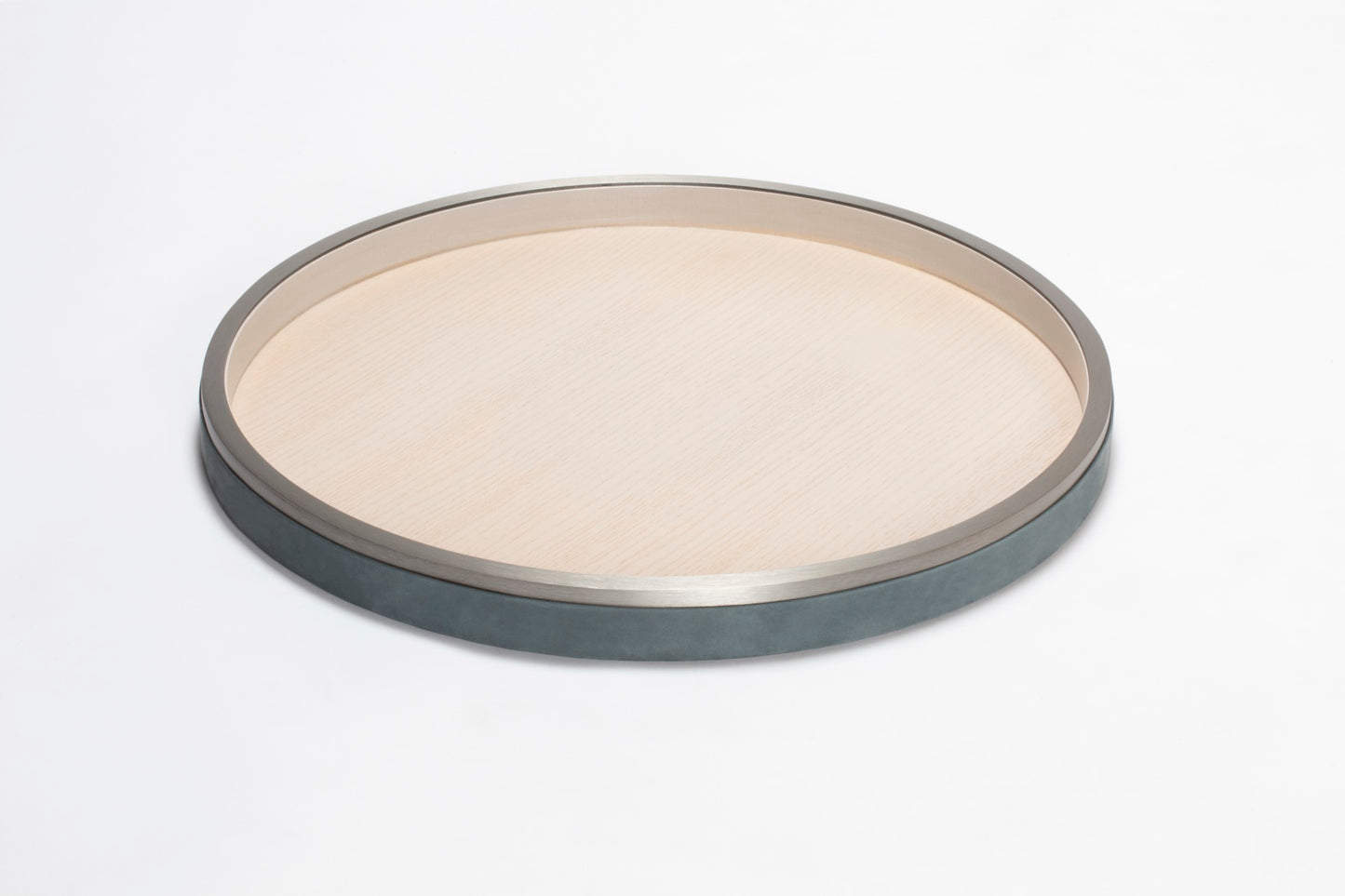 Riviere Dama | Round Tray: Wood and leather construction available in multiple sizes and finishes, designed for refined serving and decorative use | Serveware + Hospitality / Trays | 2Jour Concierge, your luxury lifestyle shop | luxury interiors, hospitality décor, elegant living, designer serveware, boutique hotels, refined lifestyle, yacht décor