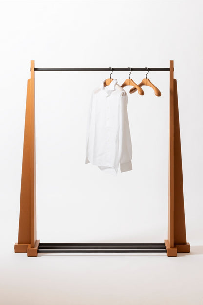 Giobagnara | Edoardo Clothes Rack: Leather-covered wood clothes rack with metal hanging bar | Serveware + Hospitality / Clothes Valets | 2Jour Concierge, your luxury lifestyle shop | premium garment storage for expensive interiors, dressing rooms, hospitality suites, and refined retail spaces