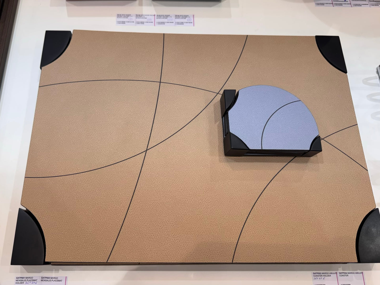 Giobagnara | Margo Placemat Set: Calfskin placemats with Corian® holder and graphic composition | Serveware + Hospitality / Placemats & Underplates | 2Jour Concierge, your luxury lifestyle shop | premium table settings for luxury interiors, dining environments, and hospitality concepts