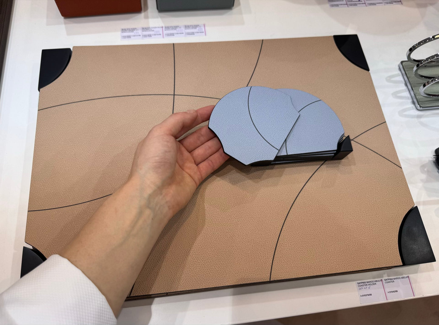 Giobagnara | Margo Placemat Set: Calfskin placemats with Corian® holder and graphic composition | Serveware + Hospitality / Placemats & Underplates | 2Jour Concierge, your luxury lifestyle shop | premium table settings for luxury interiors, dining environments, and hospitality concepts