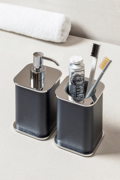 Giobagnara | Polo Leather Soap Dispenser: Leather-covered body with rounded silhouette and metal pump in chrome, bronze, or brass | The Bathroom | 2Jour Concierge, your luxury lifestyle shop | luxury soap dispenser, Giobagnara Polo, leather bathroom accessory, Italian designer soap dispenser