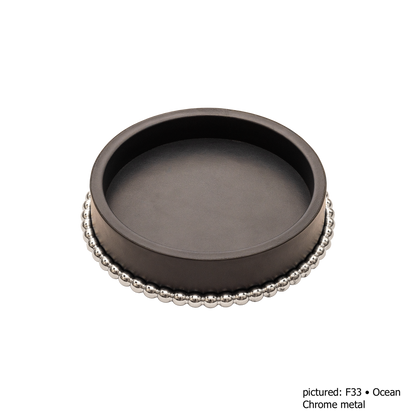 Giobagnara | Perla Round Valet Tray: Leather-covered round form with metal ring of linked spheres in chrome, bronze, or brass | Decor | 2Jour Concierge, your luxury lifestyle shop | luxury valet tray, Giobagnara Perla, round leather tray, Italian luxury decor, designer catch-all tray