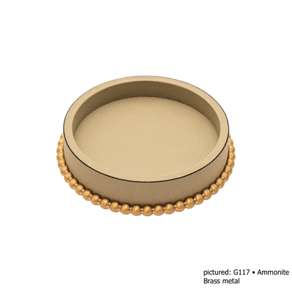 Giobagnara | Perla Round Valet Tray: Leather-covered round form with metal ring of linked spheres in chrome, bronze, or brass | Decor | 2Jour Concierge, your luxury lifestyle shop | luxury valet tray, Giobagnara Perla, round leather tray, Italian luxury decor, designer catch-all tray