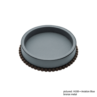 Giobagnara | Perla Round Valet Tray: Leather-covered round form with metal ring of linked spheres in chrome, bronze, or brass | Decor | 2Jour Concierge, your luxury lifestyle shop | luxury valet tray, Giobagnara Perla, round leather tray, Italian luxury decor, designer catch-all tray