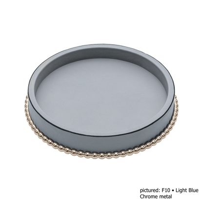 Giobagnara | Perla Round Valet Tray: Leather-covered round form with metal ring of linked spheres in chrome, bronze, or brass | Decor | 2Jour Concierge, your luxury lifestyle shop | luxury valet tray, Giobagnara Perla, round leather tray, Italian luxury decor, designer catch-all tray