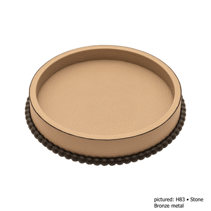 Giobagnara | Perla Round Valet Tray: Leather-covered round form with metal ring of linked spheres in chrome, bronze, or brass | Decor | 2Jour Concierge, your luxury lifestyle shop | luxury valet tray, Giobagnara Perla, round leather tray, Italian luxury decor, designer catch-all tray