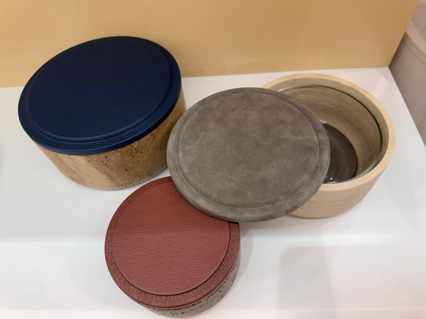 Giobagnara | Naxos Leather & Marble Bowl: Travertine marble bowl with leather-covered lid in multiple sizes | Decor / Trinket Boxes | 2Jour Concierge, your luxury lifestyle shop | luxury decorative storage, premium stone objects for expensive interiors, bedside tables, desks, and curated shelving