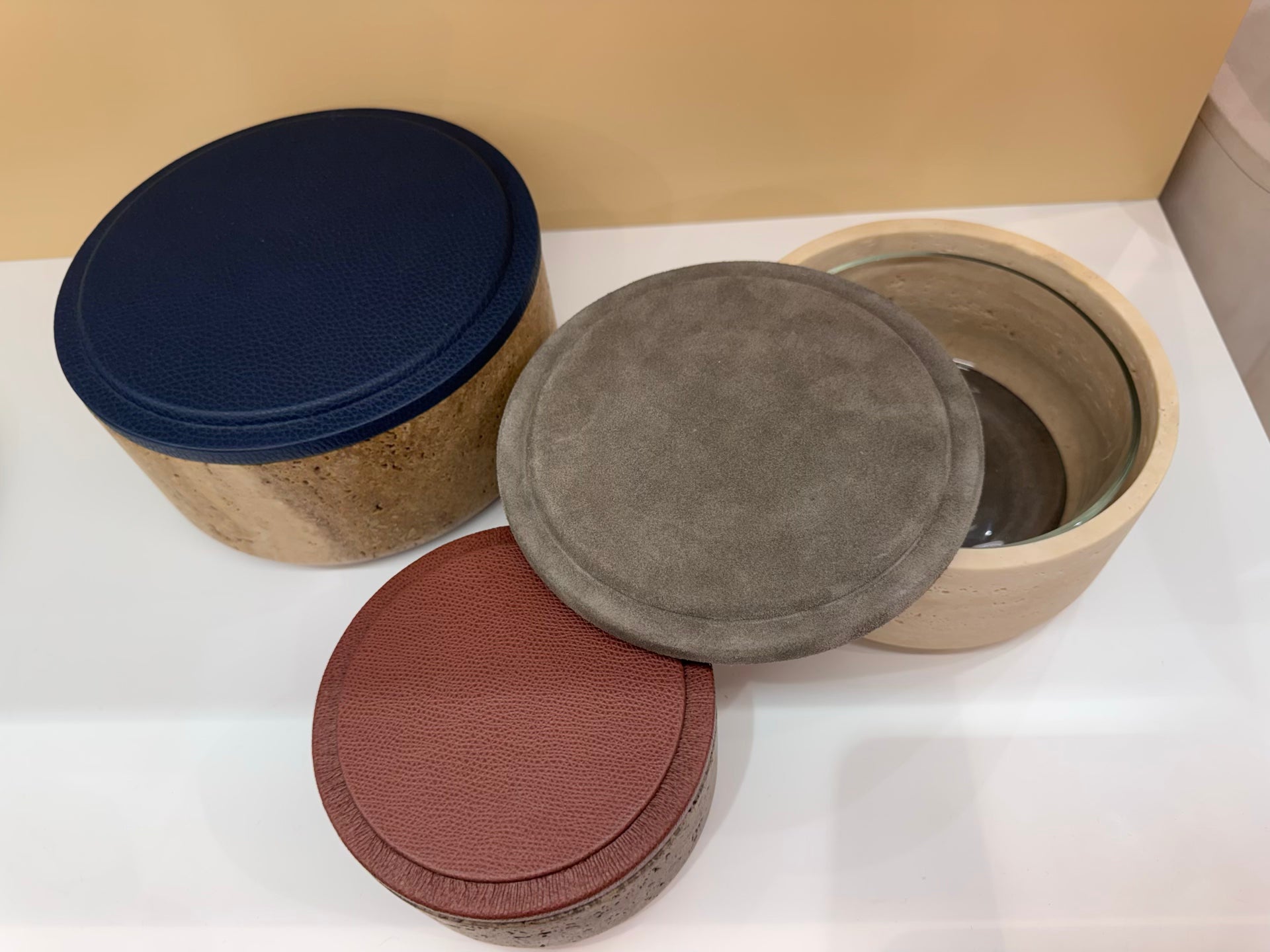 Giobagnara | Naxos Leather & Marble Bowl: Travertine marble bowl with leather-covered lid in multiple sizes | Decor / Trinket Boxes | 2Jour Concierge, your luxury lifestyle shop | luxury decorative storage, premium stone objects for expensive interiors, bedside tables, desks, and curated shelving
