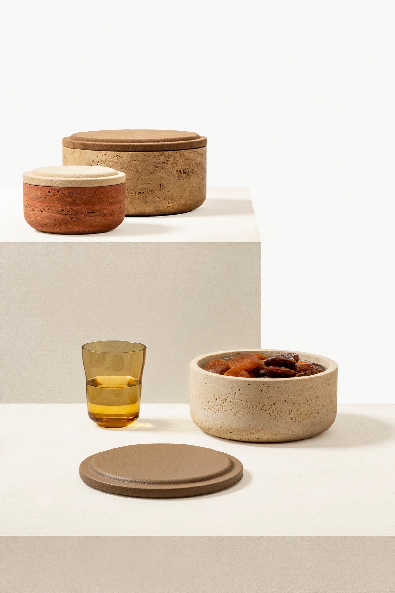 Giobagnara | Naxos Leather & Marble Bowl: Travertine marble bowl with leather-covered lid in multiple sizes | Decor / Trinket Boxes | 2Jour Concierge, your luxury lifestyle shop | luxury decorative storage, premium stone objects for expensive interiors, bedside tables, desks, and curated shelving