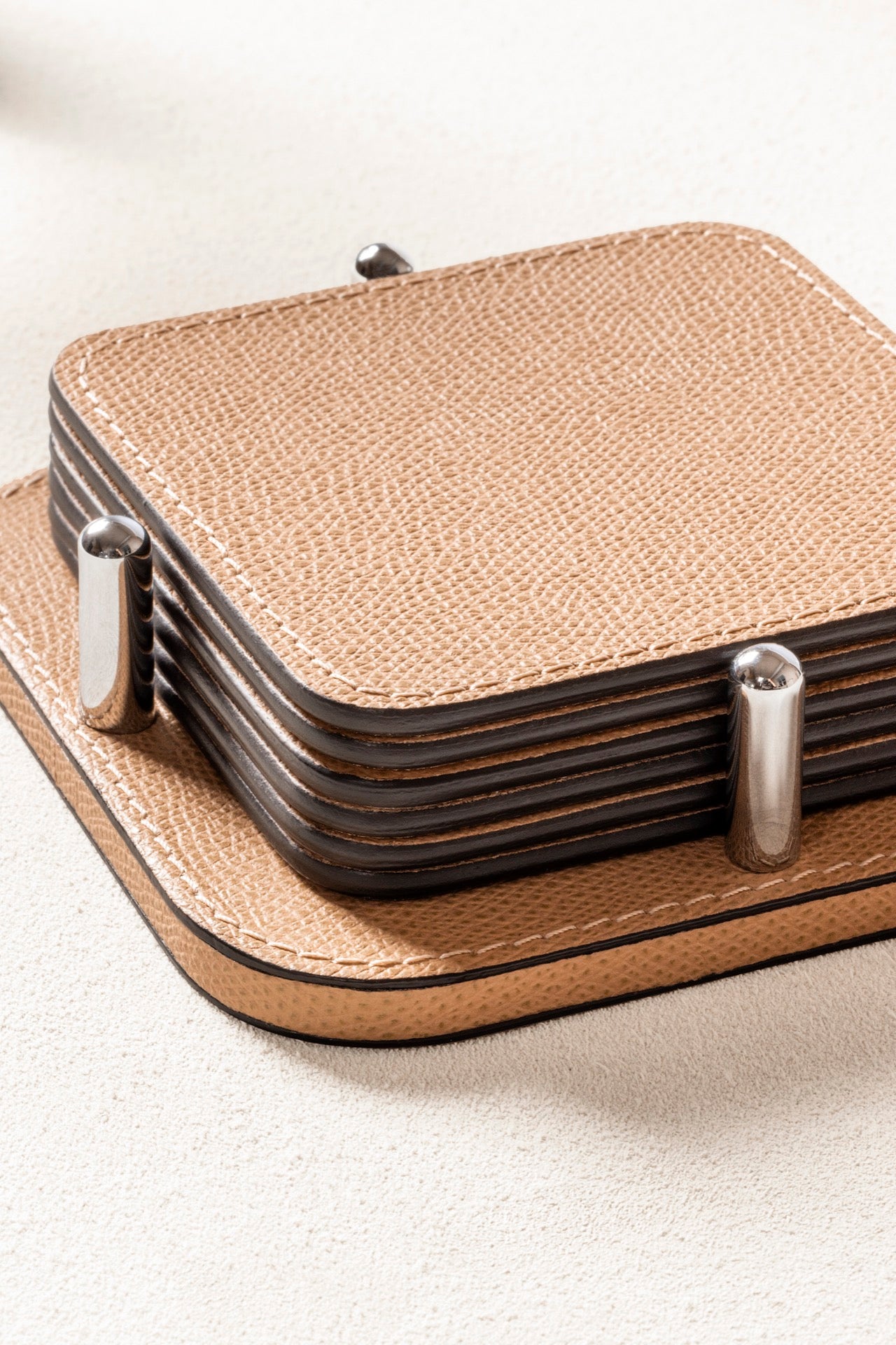 Giobagnara | David Coaster Holder with 6 Tao Coasters: Leather-covered wood coaster holder with configurable shapes and finishes | Serveware + Hospitality / Coasters | 2Jour Concierge, your luxury lifestyle shop | premium table accessories for expensive interiors, dining tables, coffee tables, and refined hospitality spaces